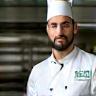 Martin H. standing with chef hat